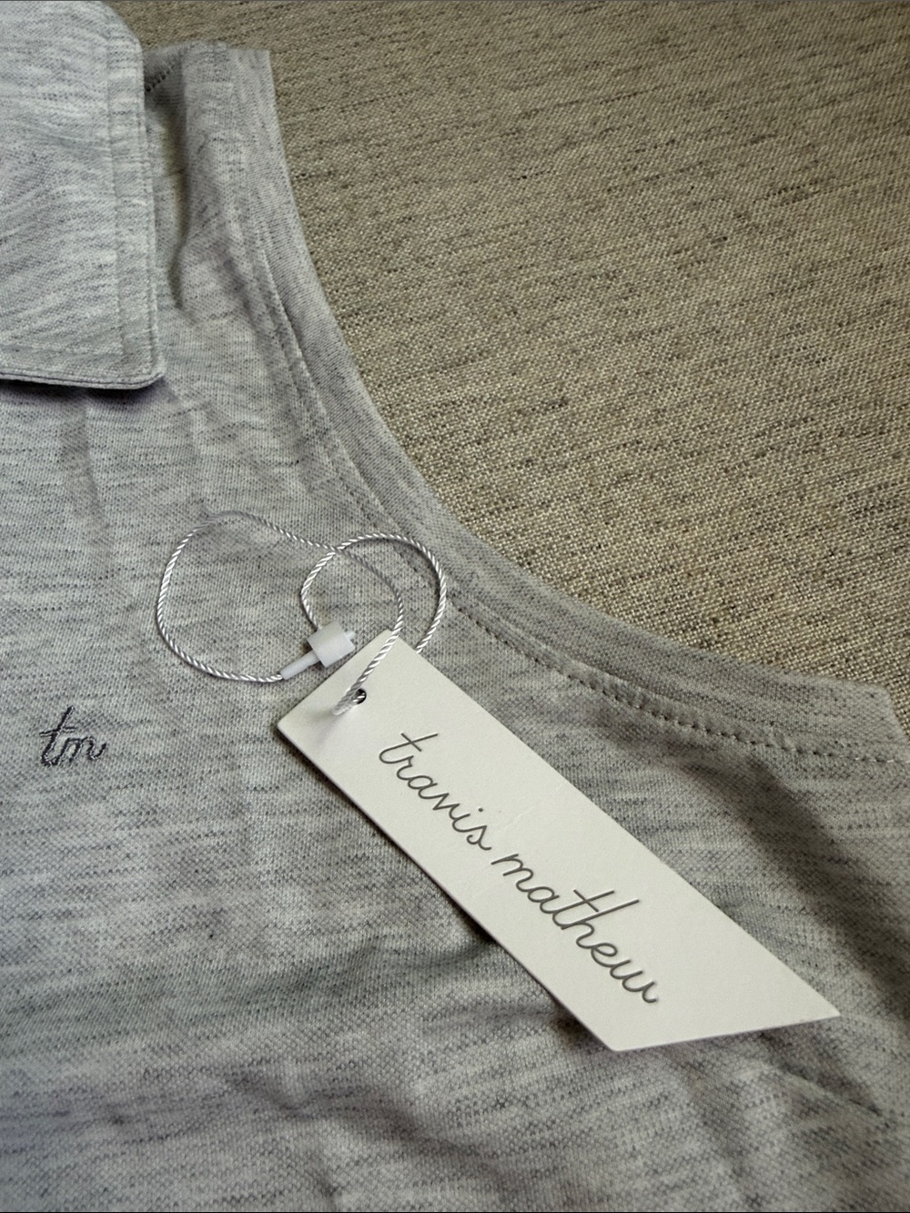Women’s Travis Matthew Sleeveless Polo Top in Light Heather Gray - Picture 3 of 5